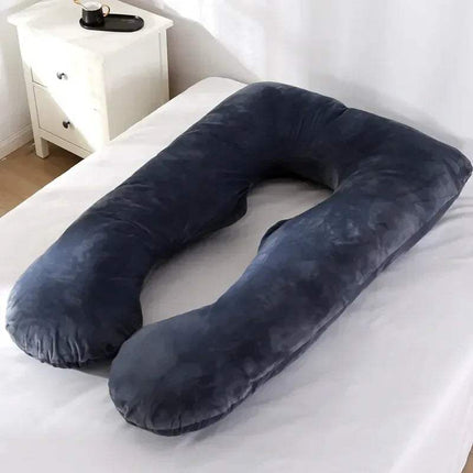 Navy blue 130x70cm Pregnancy Pillow on a bed in a bedroom setting.