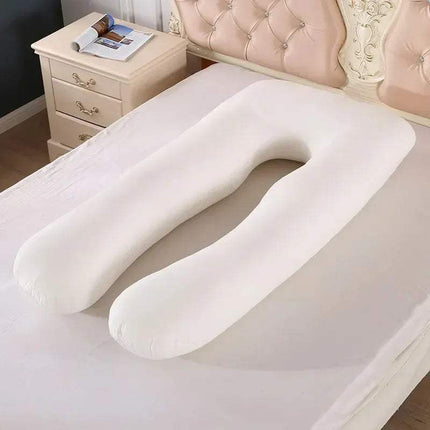 U-shaped 130x70cm Pregnancy Pillow on a bed in a bedroom setting