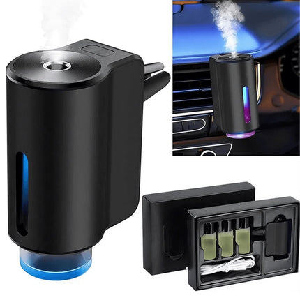 Electric Car Air Freshener vent clip USB aromatherapy diffuser emitting refreshing mist in car. Astoria Lifestyle