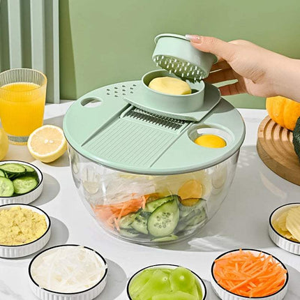 7-Piece Multifunction Salad Spinner Set with vegetable washer and slicer in use with fresh ingredients. Astoria Lifestyle