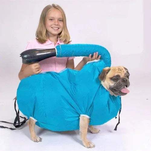Girl using a Portable Dog Drying Bag on a pug dog for fast drying after a bath.