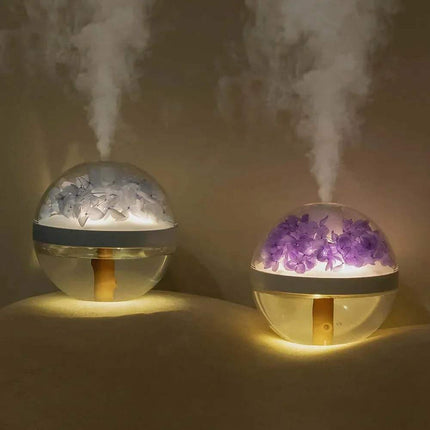 270ML Flower Air Humidifier Two spherical humidifiers emitting mist with decorative elements inside, on a dark background.