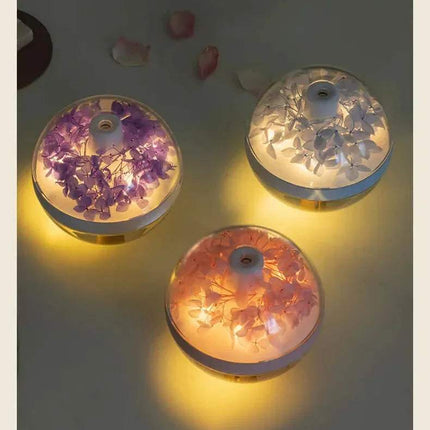 270ML Flower Air Humidifier Three round floral night lights on a gray surface with flower petals around.