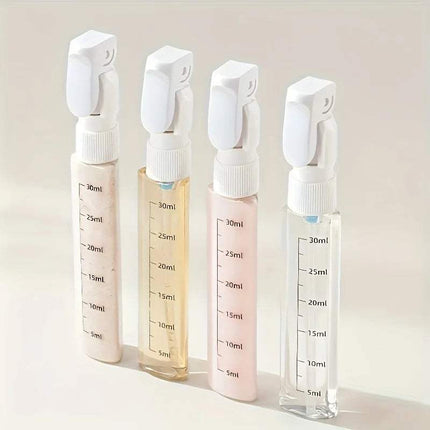 4-in-1 Travel Dispenser Bottle showcasing four clear bottles for shampoo, conditioner, lotion, and body wash.