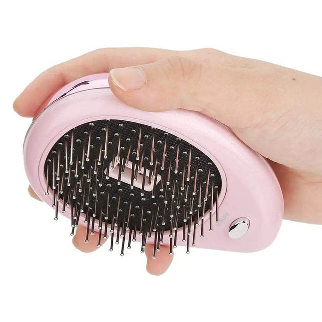 Hand holding the Anti-Static Ionic Vibrating Hair Brush for smooth and frizz-free hair.