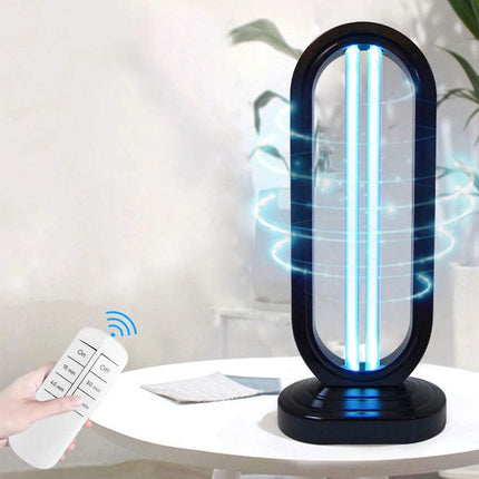 UVC Light Sanitizer with Remote Control in use, emitting blue light for disinfection of surfaces.