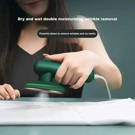 Electric 30W Mini Portable Steam Iron being used for wrinkle removal on a shirt with powerful steam. - Astoria Lifestyle