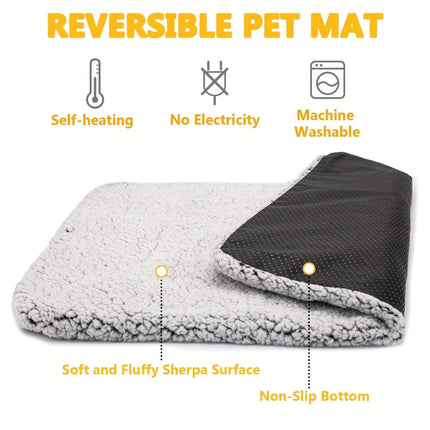 Self-Heating Pet Pad showing reversible design, soft Sherpa surface, and non-slip bottom for pet comfort.