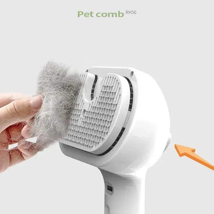 Pet Steam Grooming Comb showcasing hair removal feature with collected pet fur for easy cleaning. - Astoria Lifestyle