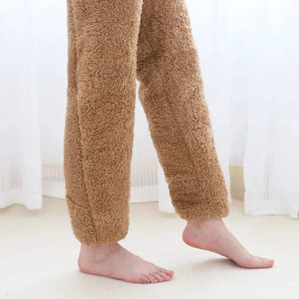 Brown Fuzzy Leg Warmer Stockings turned into a pants worn by a person on a light-colored floor with white curtains in the background