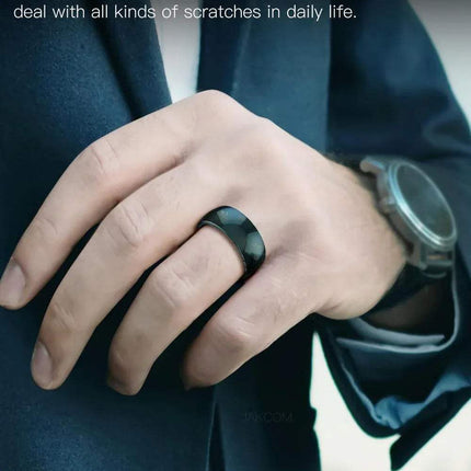Person wearing the Jakcom R4 Smart Ring, showcasing its scratch-resistant properties and sleek design.
