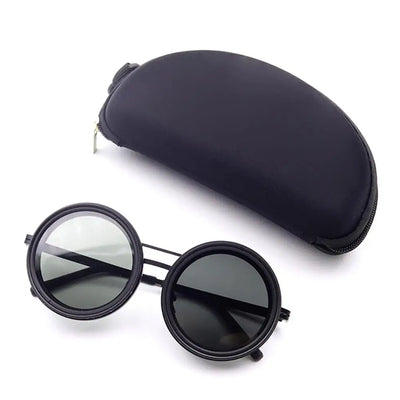 Adjustable Dimming Sunglasses round with black frame and reflective lenses, accompanied by a black case on a white background.