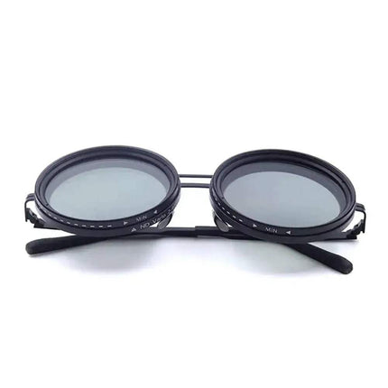 Adjustable Dimming Sunglasses black with round lenses on a white background