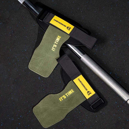 Two green Weightlifting Grip Pads for Secure, Comfortable Lifting