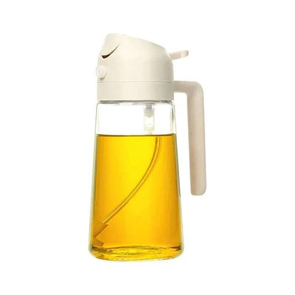 2-in-1 Oil Spray Bottle for easy, healthy cooking with a sleek design and clear glass container.