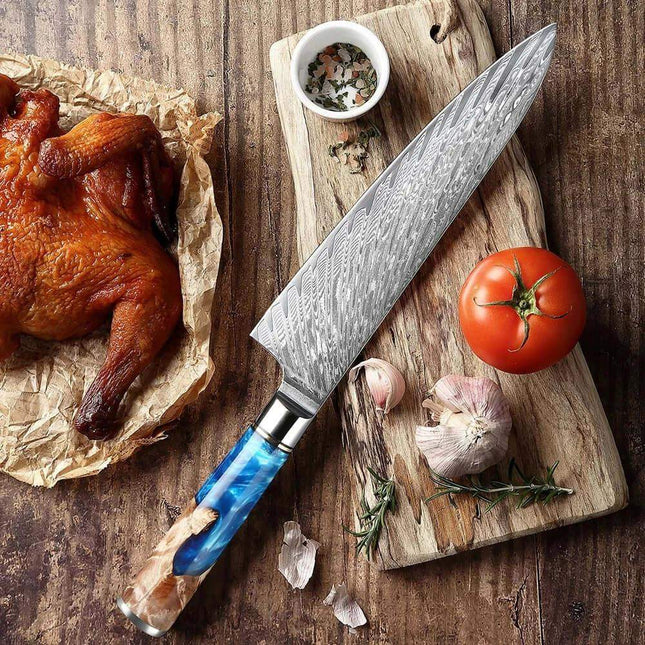 8 Inch Chef Knife with blue handle on a wooden cutting board with roasted chicken, tomato, and garlic.