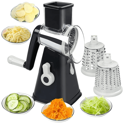 3-in-1 Rotary Cheese Grater & Vegetable Slicer Black manual vegetable grater with three different attachments and grated vegetables displayed.