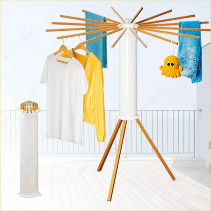 Foldable Octopus-Style Clothes Drying Rack with clothes and a toy on a white background