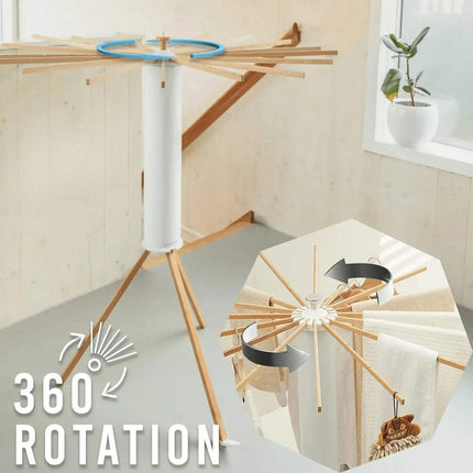 Foldable Octopus-Style Clothes Drying Rack with clothes on a light-colored floor, featuring '360 Rotation' text.