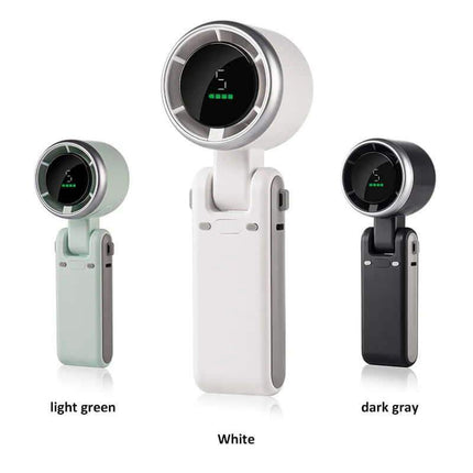 Handheld Turbo Fan. Three models of a portable device in light green, white, and dark gray on a white background.