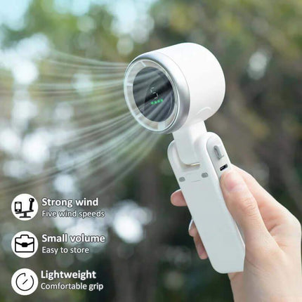 Handheld Turbo Fan being used outdoors with features highlighted on the screen.