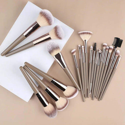 Professional Makeup Brush Set featuring various brushes for foundation, blush, contour, and more on a light surface.