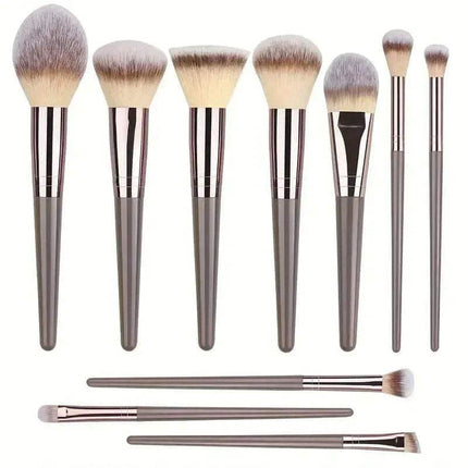Professional Makeup Brush Set featuring various brushes for foundation, blush, eyeshadow, contour, and highlighter.
