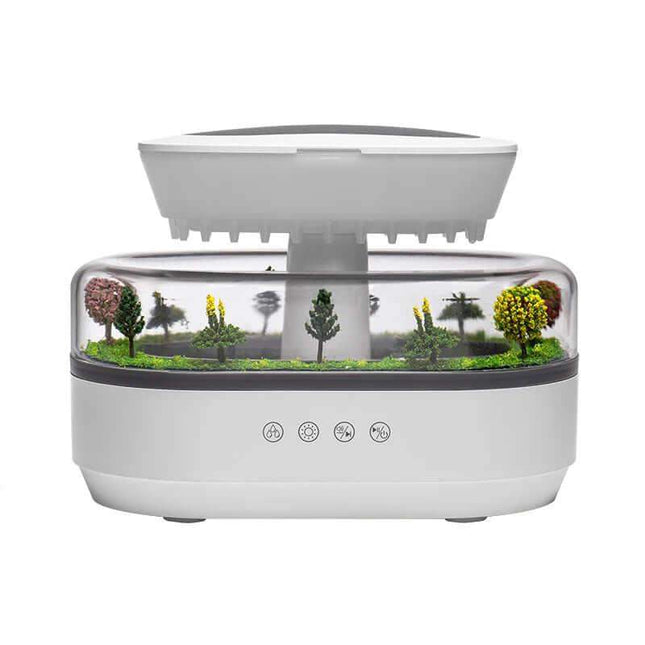 Rain Cloud Aroma Diffuser with a small garden display on a white background