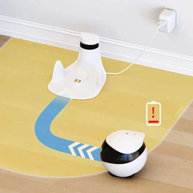 Remote Camera Robot 1080P on a wooden floor with a charging station and power outlet in the background.