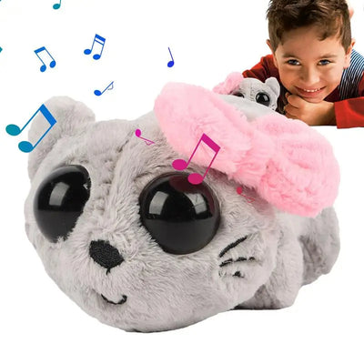 Sad Hamster Plush Toy with a pink bow and musical notes, child partially visible