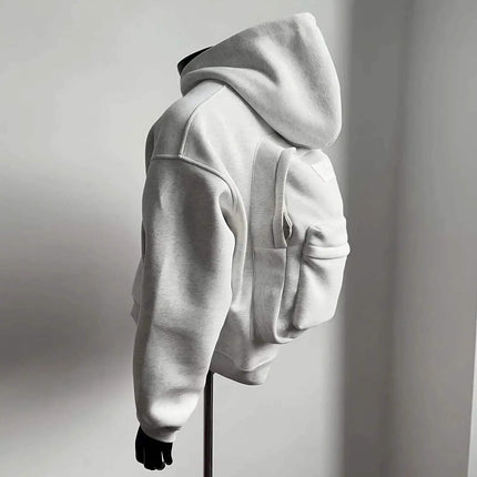 Hoodie - Gray hoodie on a mannequin against a plain background