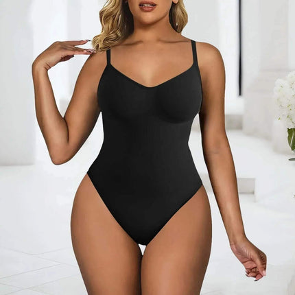 Seamless High Elastic Bodysuit for Women. Woman wearing a black one-piece swimsuit in a minimal indoor setting