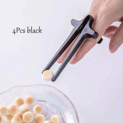 Snack Grabbers black to pick up a ball from a clear container on a white background