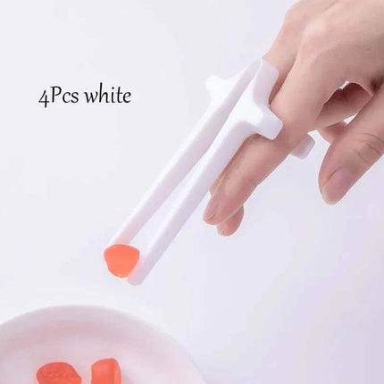 Snack Grabbers. Hand holding a white tool with orange ends on a light gray background, labeled '4Pcs white'.