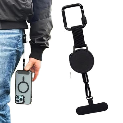 Black phone lanyard with carabiner attached to a phone case, held by a person.