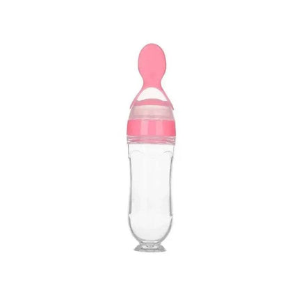 Clear Baby Feeding Squeeze Spoon Safe, Easy, and Mess-Free Feeding with pink cap and nozzle on a white background