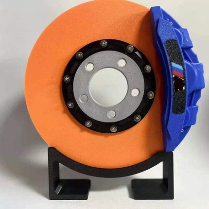 Creative DIY Brake Disc LED Atmosphere Light décor with vibrant orange brake disc and blue caliper display.