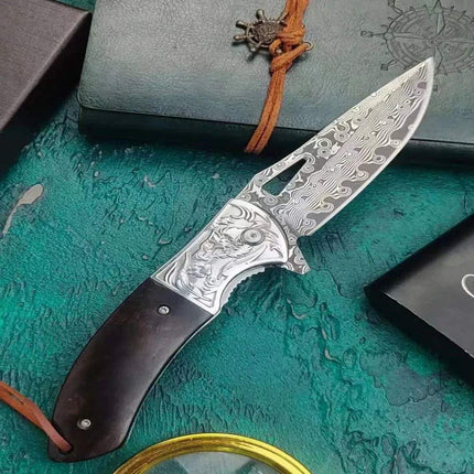 Damascus Steel Pocket Knife Camping tool with intricate blade design and wooden handle on textured background.