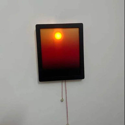 Kinetic Sunrise Wall Light adjustable sunset glow lamp displayed on a wall, creating a warm, atmospheric effect.