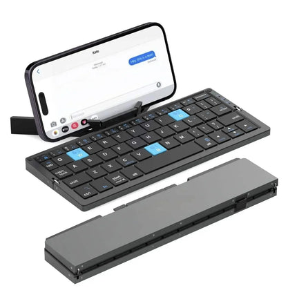 Mini Foldable Bluetooth Keyboard attached to a smartphone for Travel & Work