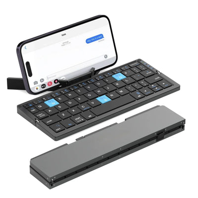 Foldable keyboard attached to a smartphone on a white background