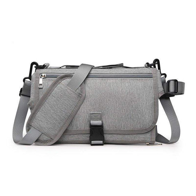 Light Gray Portable Baby Changing Pad Foldable Waterproof Diaper Mat for Travel with a strap on a white background