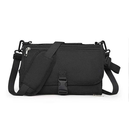 Black Portable Baby Changing Pad Foldable Waterproof Diaper Mat for Travel bag with a strap on a white background