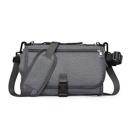 Dark Gray Portable Baby Changing Pad Foldable Waterproof Diaper Mat for Travel bag with multiple compartments on a white background