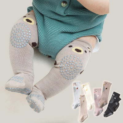 Baby Knee Non-Slip Floor Socks Baby wearing gray knee-high socks with bear designs, with additional pairs displayed below on a light background.