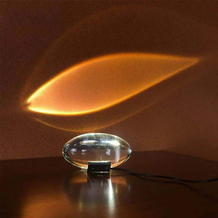 Crystal Atmosphere Lamp Elegant Ambient Lighting casting a warm glow on a dark surface - Astoria Lifestyle