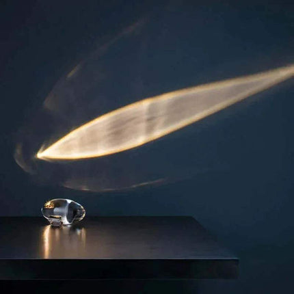 Crystal Atmosphere Lamp Elegant Ambient Lighting on a dark surface with a light beam effect - Astoria Lifestyle