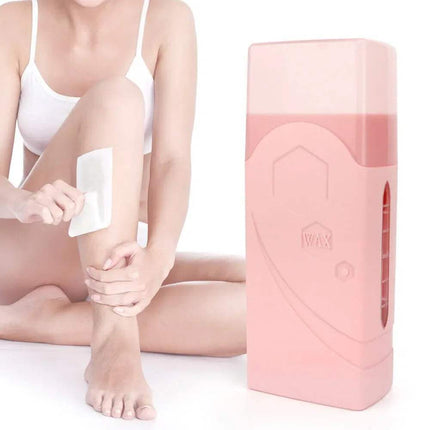 Person applying wax to her leg with a pink Depilatory Wax Heater on a white background