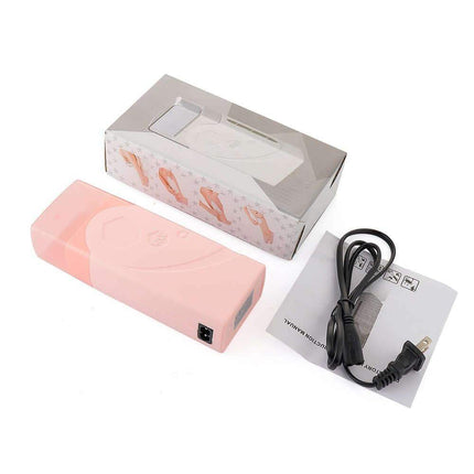 Pink Depilatory Wax Heater with charging cable and box on a white background