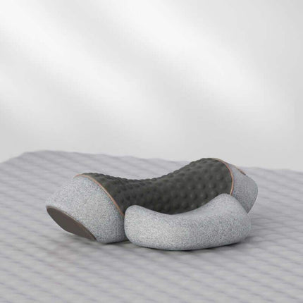 Gray and brown Electric Neck Massage Pillow on a striped surface
